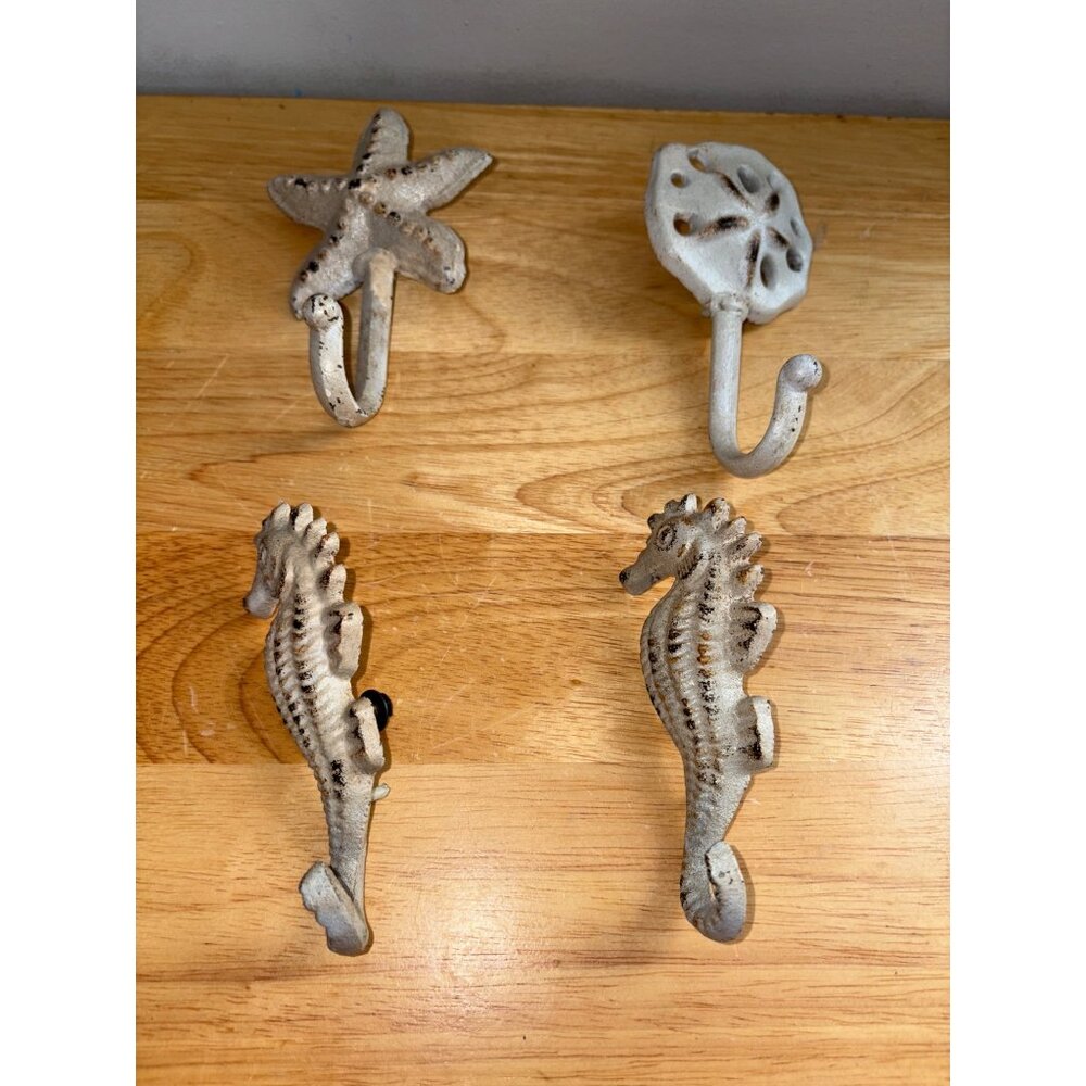 Set Of 4 Nautical-Themed Cast Iron Wall Hooks Seahorse Starfish Sand Dollar